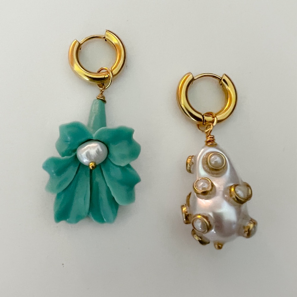 Mismatched baroque pearl and turquoise flower hoop earrings.